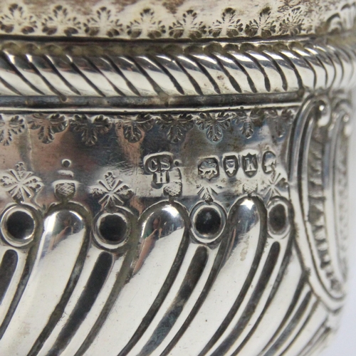 87 - A Victorian silver sugar bowl, Charles Stuart Harris, London 1885, the flared rim with wrythen body ... 