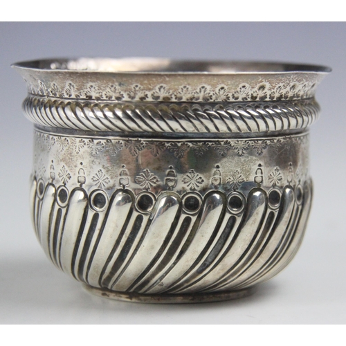 87 - A Victorian silver sugar bowl, Charles Stuart Harris, London 1885, the flared rim with wrythen body ... 