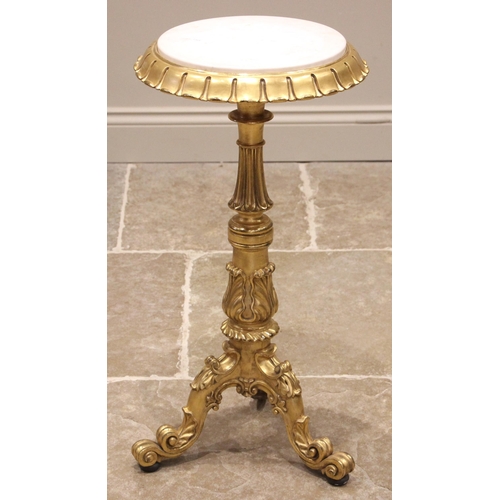 1000 - A gilded marble top pedestal lamp table, mid 19th century, the circular white marble top within a mo... 