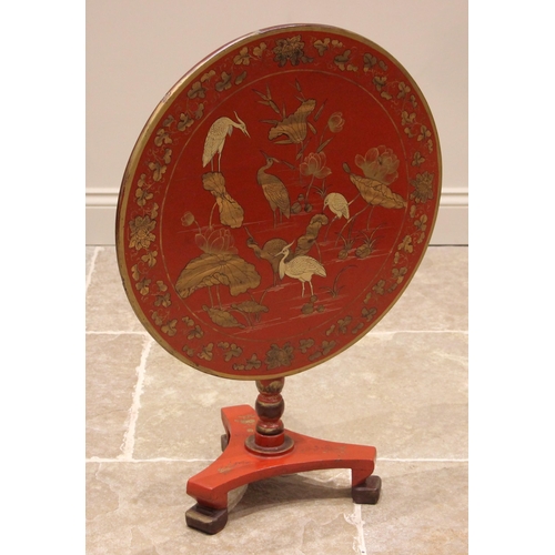 1003 - A late 19th century Chinese red lacquer chinoiserie tilt top occasional table, the circular top deta... 