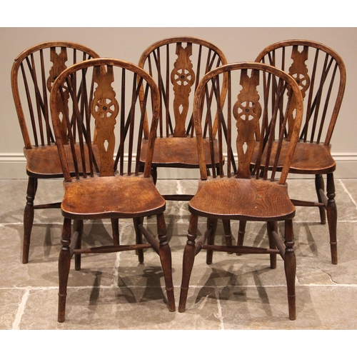 1010 - A set of five ash and elm wheel back kitchen chairs, late 19th century, stamped 'J.S 26', each with ... 