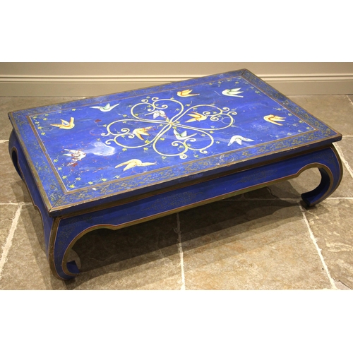 1017 - A painted Indian hardwood centre or coffee table, the rectangular plank top centred with painted cor... 