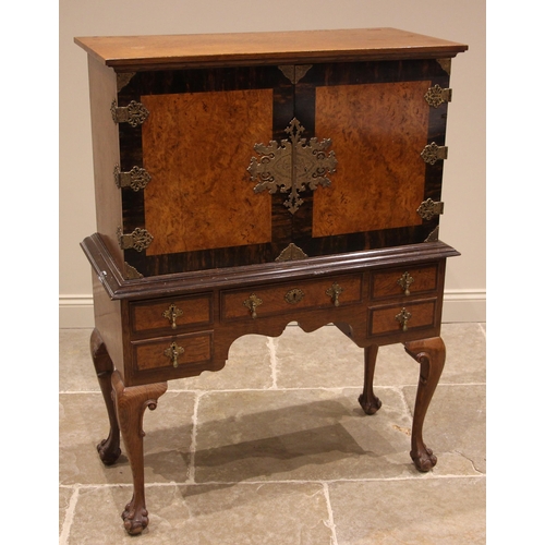 1029 - A 17th century style oak and pollard oak cabinet on stand, by Warings, early 20th century, the pair ... 