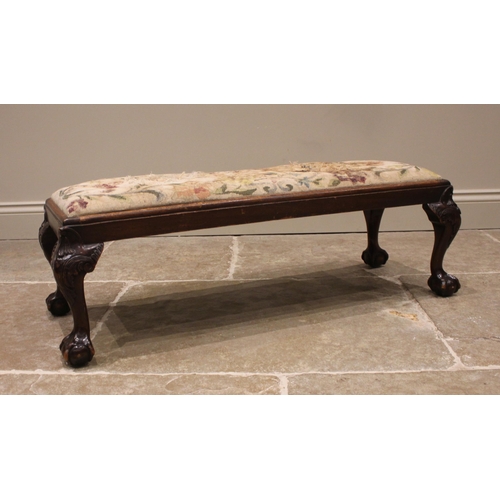 1043 - A Chippendale revival mahogany long stool, early 20th century, the drop-in tapestry seat (at fault),... 