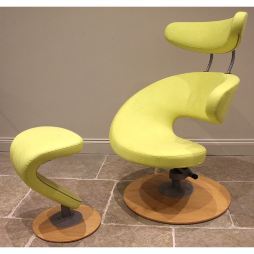 1054 - An Olav Eldoy for Stokke, Peel chair and ottoman, early 21st century, in vibrant yellow fabric, the ... 