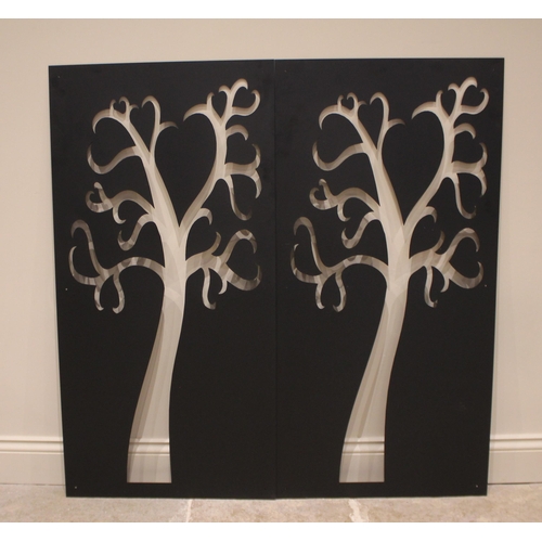 1059 - Seven powder coated metal stencil wall or fence panels, each depicting a stylised tree, 120cm H x 60... 