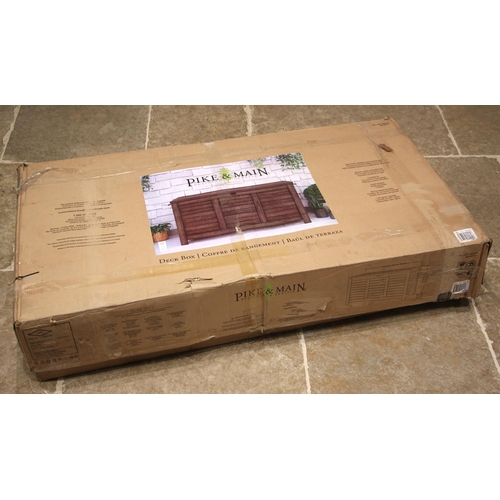 1073 - A Pike & Main teak deck box, of slatted form, 72cm H x 139cm W x 69cm D, boxed requires assembly