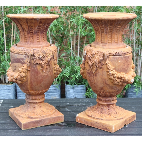 1079 - A pair of composite fibreglass simulated terracotta garden water features, modelled as garden urns w... 