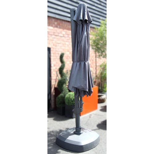 1082 - A Kettler 3.5 metre free arm parasol with LED lighting and wireless speaker, the adjustable and exte... 