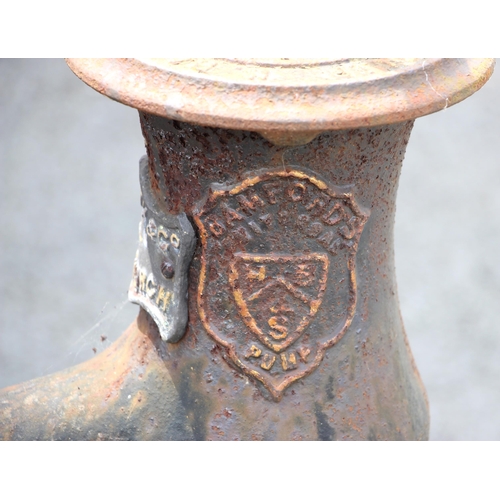 1088 - A cast iron water pump by Bamford & Sons, Uttoxeter, late 19th century, of typical cylindrical form,... 