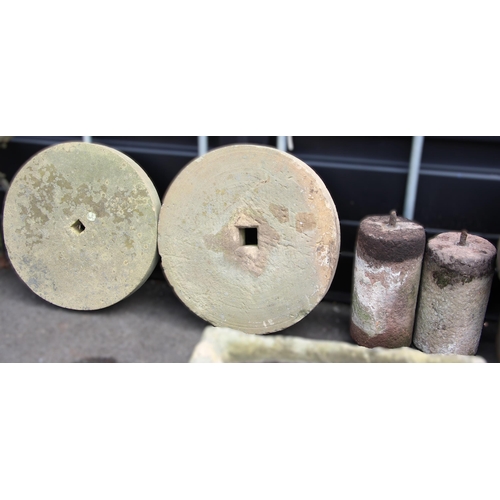 1098 - Two large sandstone mill stones, 80cm and 77cm D, along with a near pair of cylindrical sandstone pi... 