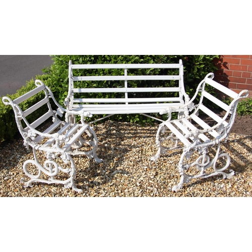 1104 - A Victorian cast iron serpent and grape pattern garden bench and two chairs by Coalbrookdale, late 1... 