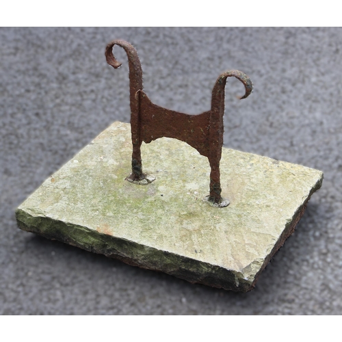 1108 - A 19th century sandstone and wrought-iron boot scraper, of typical 'H' form with scroll terminals se... 