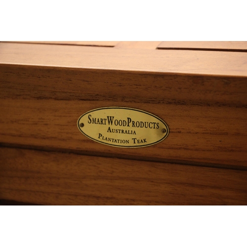 1111 - A Smart Wood plantation teak patio storage chest, of slatted form, the gently domed cover opening to... 