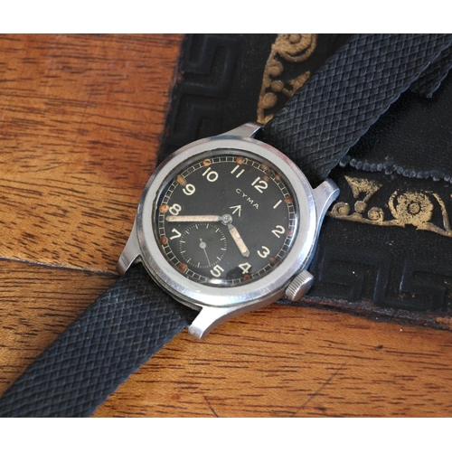 163 - MILITARY INTEREST: A Cyma 'Dirty Dozen' wristwatch, the circular black dial with luminous hands, Ara... 