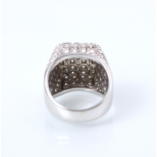 177 - An Italian white gold diamond set cocktail ring, the square shaped head with round cut diamonds set ... 