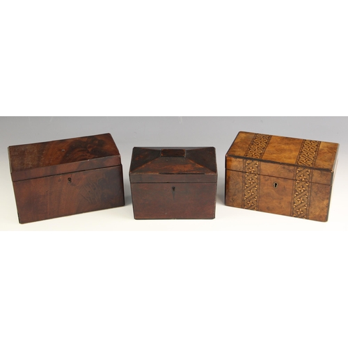 847 - A George III mahogany tea caddy, of rectangular form, the hinged cover opening to three lidded compa... 