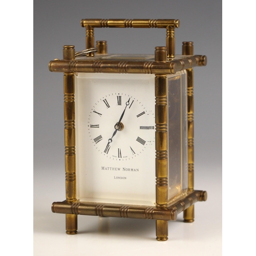 856 - An English 20th century brass cased carriage timepiece by Matthew, Norman, London, the 5.5cm white e... 