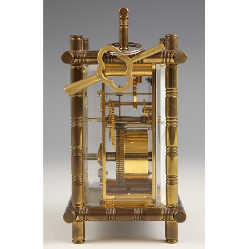 856 - An English 20th century brass cased carriage timepiece by Matthew, Norman, London, the 5.5cm white e... 