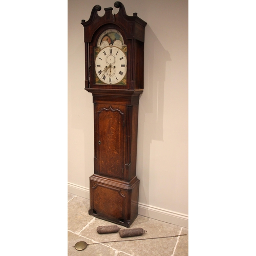 858 - A George III oak and mahogany cross banded eight day longcase clock, the hood with a twin swan neck ... 