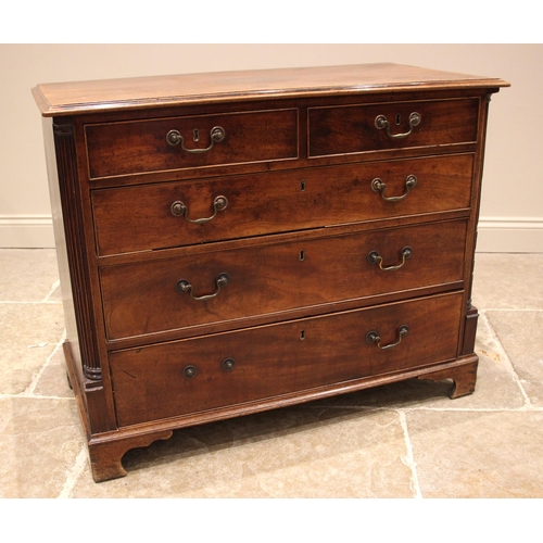 920 - A George III mahogany chest of drawers, formed with two short and three long pine lined, graduated a... 