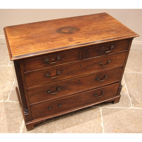 920 - A George III mahogany chest of drawers, formed with two short and three long pine lined, graduated a... 