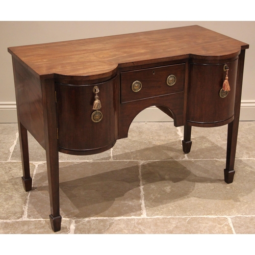 928 - A 19th century mahogany double bowfront sideboard, the central frieze drawer and arched recess flank... 