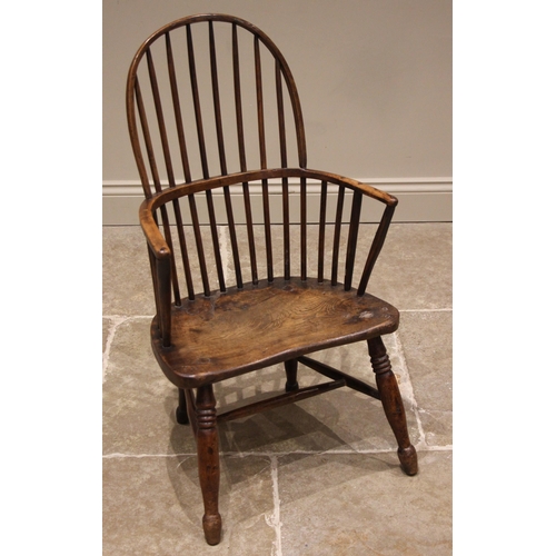 944 - A 19th century ash and elm Windsor farmhouse chair, impressed 'T.H' to the seat, the hoop back over ... 