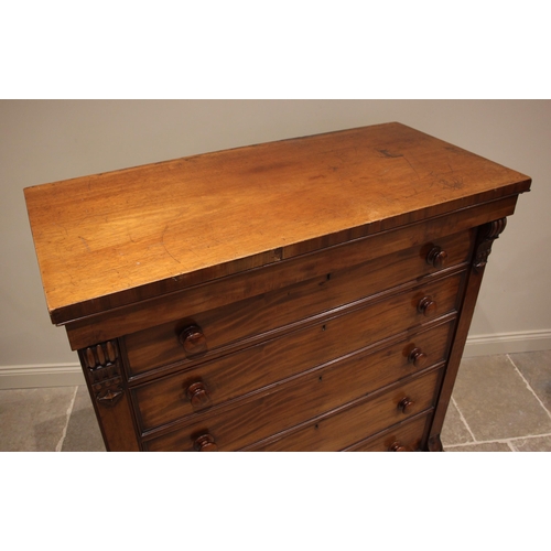 960 - A Victorian mahogany Scottish chest of drawers, formed with a plain frieze over five graduated ash l... 