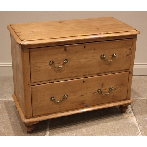 962 - A Victorian pine chest of drawers, the rectangular moulded top with rounded front corners over two l... 