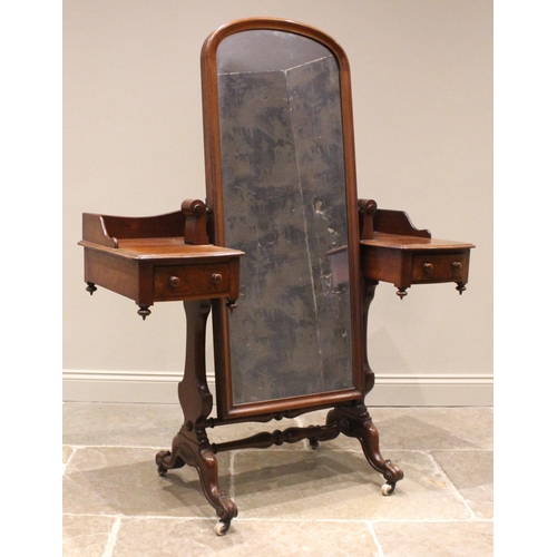 975 - A Victorian mahogany cheval mirror dressing table, the dressing table with a three quarter gallery a... 