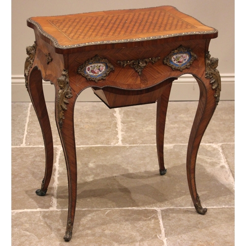 993 - A French Louis XVI style kingwood vanity or work table, late 19th early 20th century, the serpentine... 