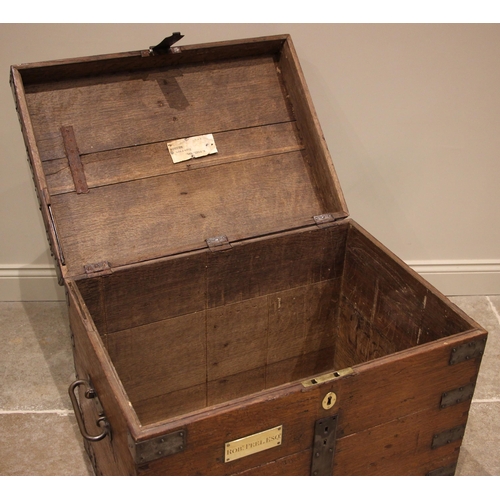 996 - A 19th century oak and metal bound silver trunk, the gently domed cover applied with metal strapwork... 