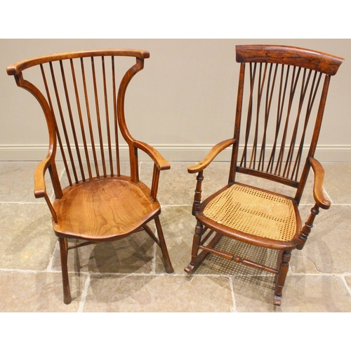 1024 - An ash Arts and Crafts Windsor elbow chair, late 19th/early 20th century, with curved top and side r... 