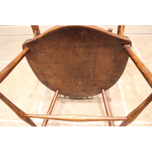 1024 - An ash Arts and Crafts Windsor elbow chair, late 19th/early 20th century, with curved top and side r... 