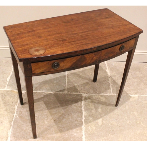 918 - An early 19th century mahogany bow front side table, the single pine lined frieze drawer applied wit... 