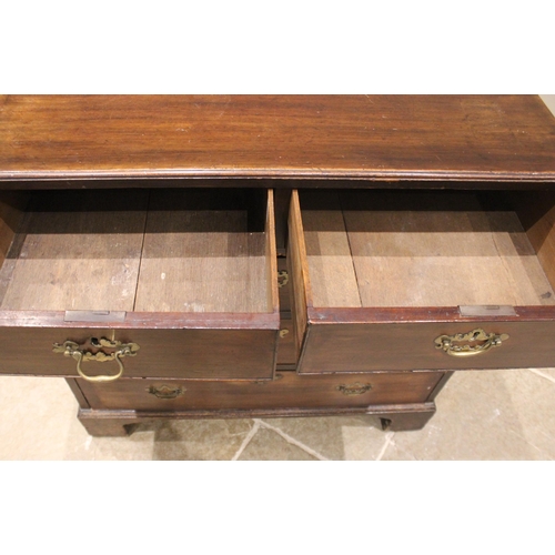 923 - A George III mahogany chest of drawers, formed with two short over three long graduated drawers, oak... 