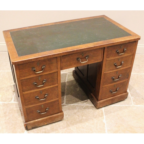 958 - A Victorian walnut twin pedestal desk, the skiver inset top over a central frieze drawer, flanked by... 