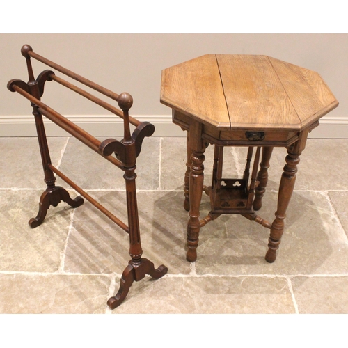 961 - A medium oak ecclesiastical occasional table, early 20th century, the octagonal moulded top over a p... 