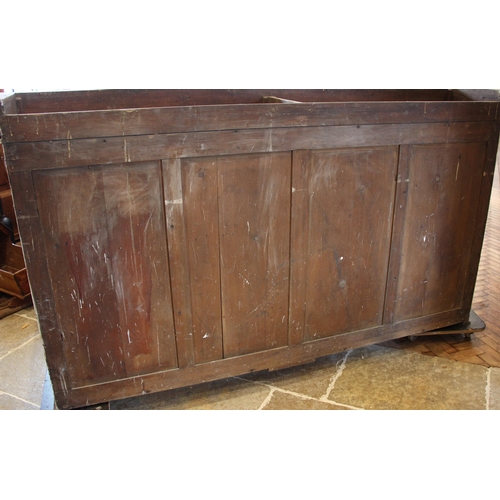 986 - A Victorian scumbled pine housekeepers cupboard, the moulded cornice over a central pair of cupboard... 