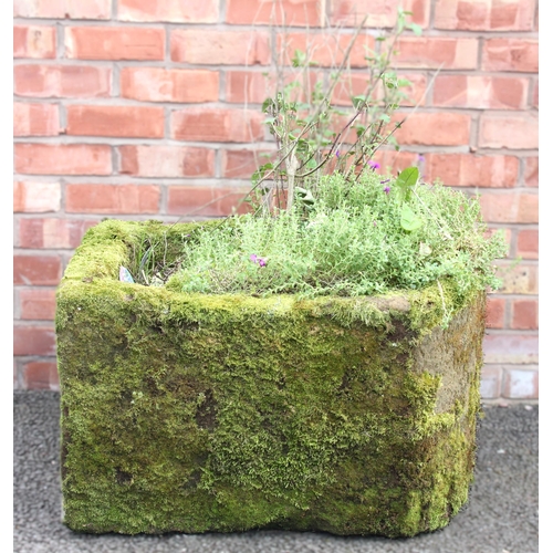 1114 - A 19th century sandstone water pump trough, of typical bowfront form, 46cm H x 73cm W x 60cm D