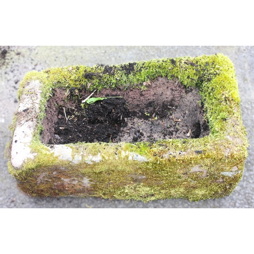 1117 - A 19th century sandstone trough, of rectangular form with drain hole to the side, 24cm H x 65cm W x ... 