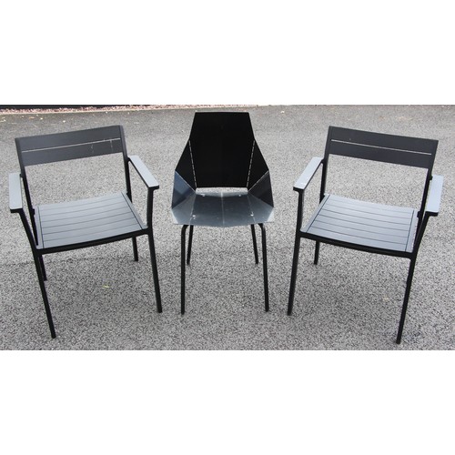 1080 - A pair of powder coated metal garden/patio chairs by Case, finished in black, 77cm high, along with ... 