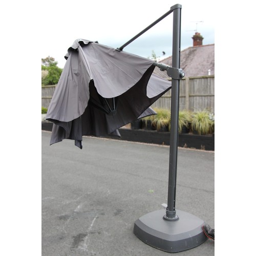 1082 - A Kettler 3.5 metre free arm parasol with LED lighting and wireless speaker, the adjustable and exte... 