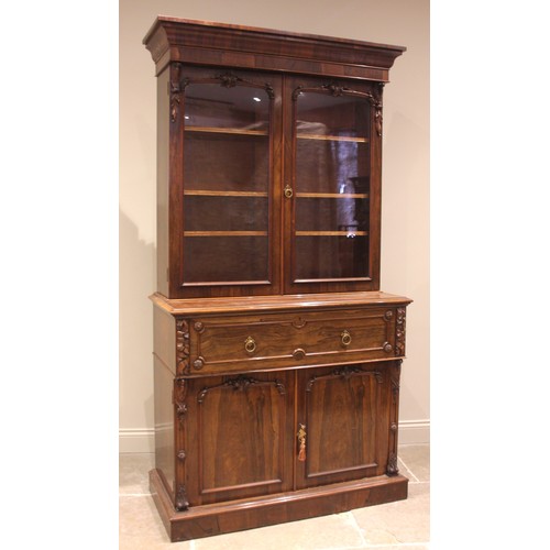 957 - A William IV rosewood secretaire library bookcase, the cavetto cornice over a pair of glazed doors a... 