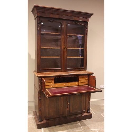 957 - A William IV rosewood secretaire library bookcase, the cavetto cornice over a pair of glazed doors a... 