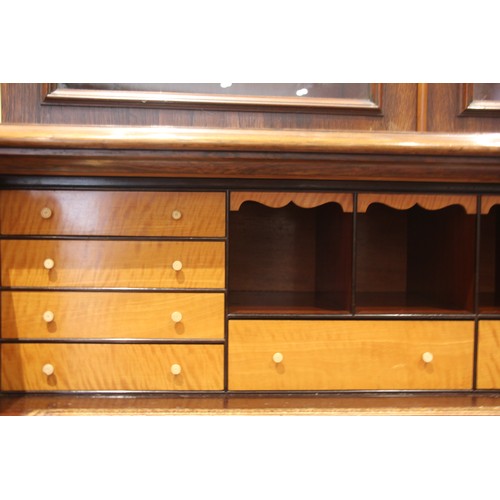 957 - A William IV rosewood secretaire library bookcase, the cavetto cornice over a pair of glazed doors a... 