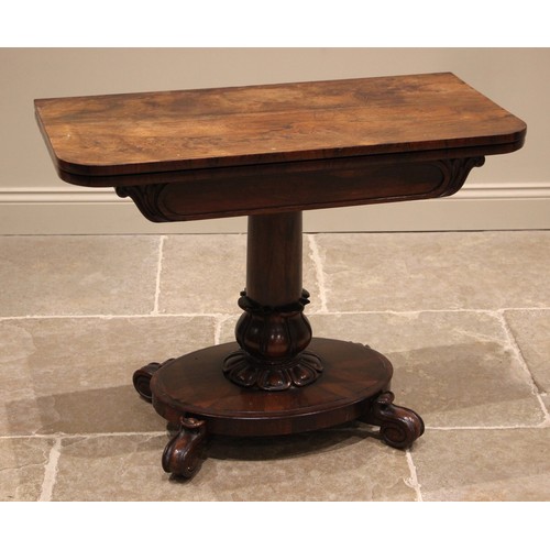 951 - A William IV rosewood pedestal card table, the rectangular folding top opening to a circular baize l... 