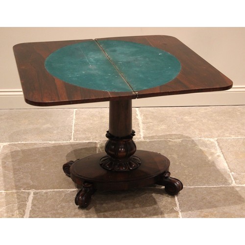 951 - A William IV rosewood pedestal card table, the rectangular folding top opening to a circular baize l... 