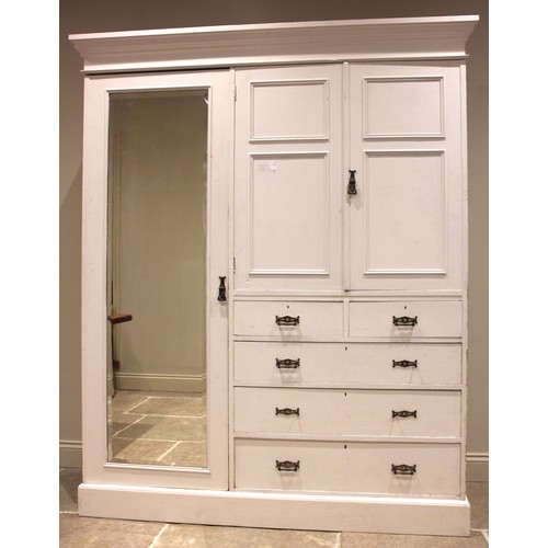 969 - A Victorian painted pine compactum wardrobe, the moulded cavetto cornice over a pair of panelled doo... 